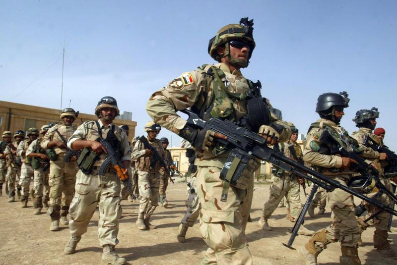 Iraq army soldiers and commandos show off their anti-terrorism skills and skills against criminal activities at a camp in the northern Iraqi city of Kirkuk.